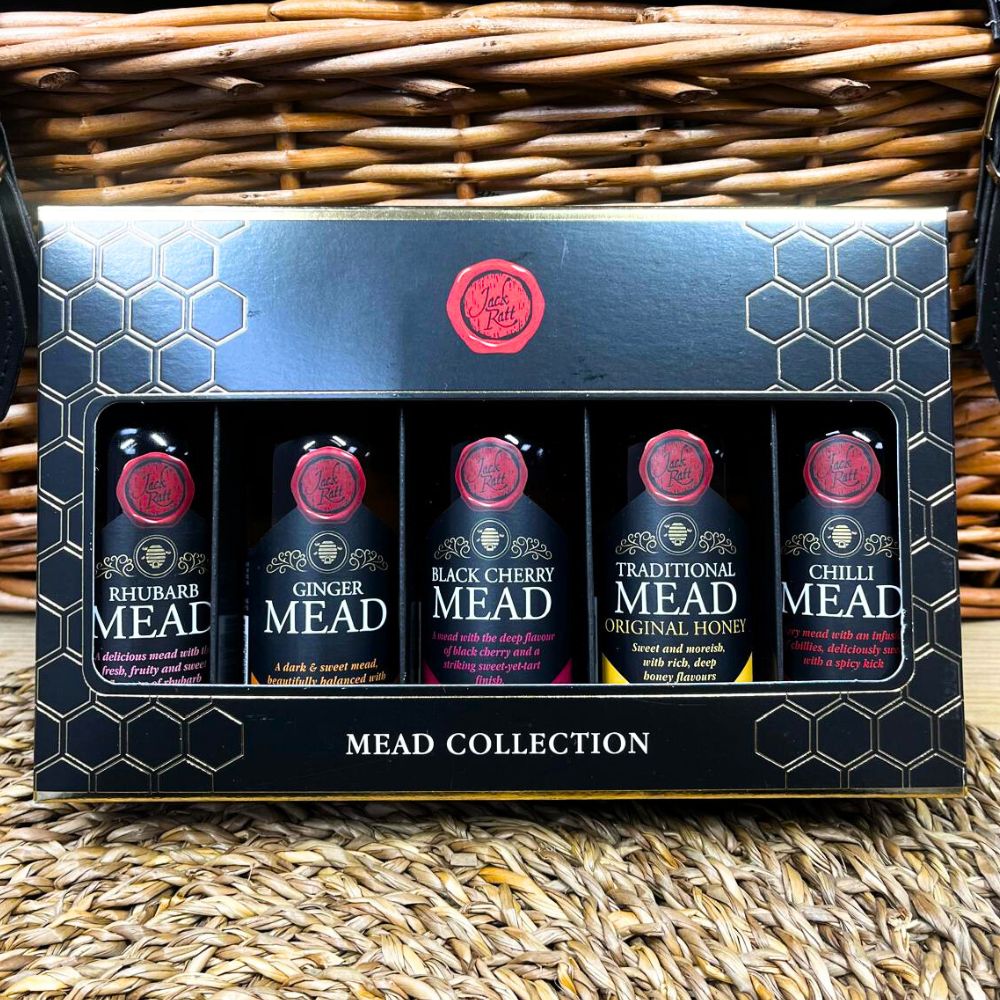 Mead collection packaging with five bottles on a woven basket background