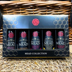 Mead collection packaging with five bottles on a woven basket background