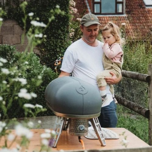 Man and Child creating The Rea Cure salamis and meats